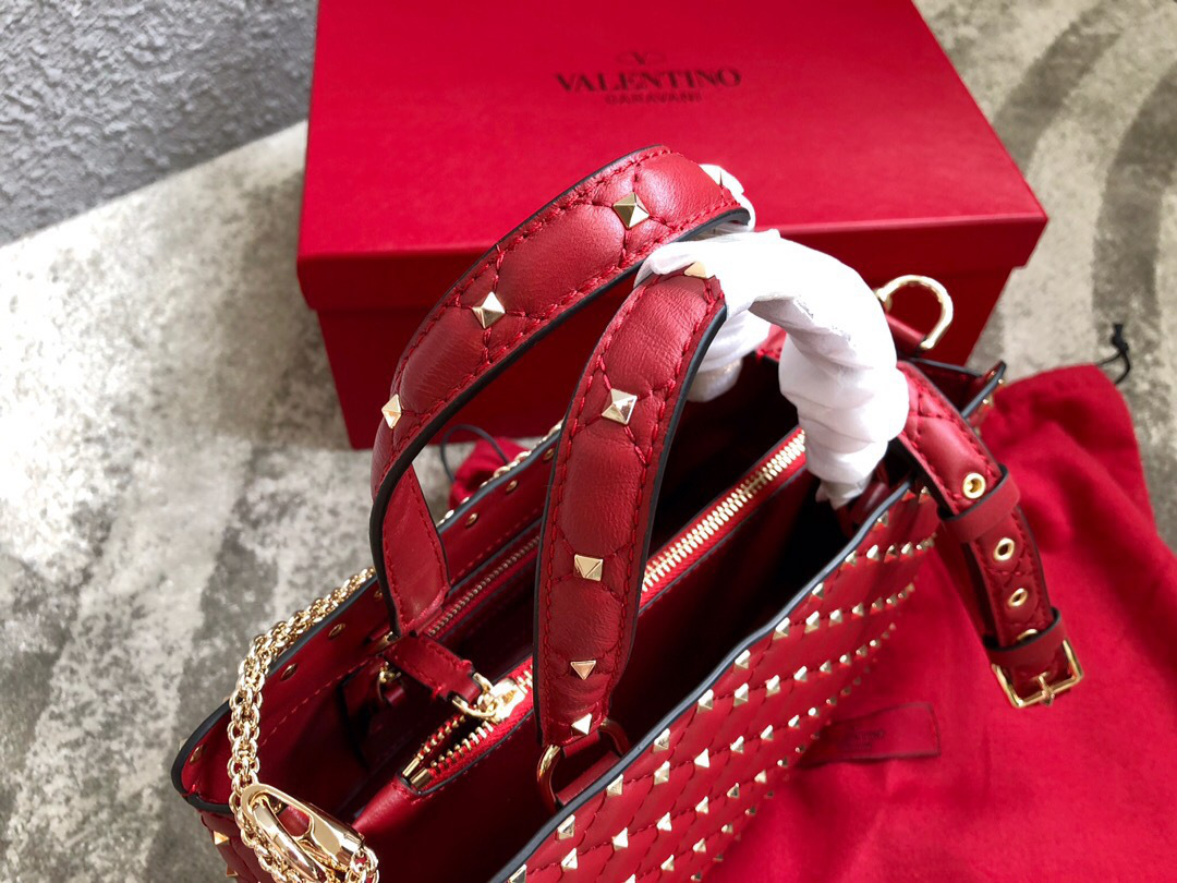 Va1e*ntin0 Garavani Rockstud Spike Lambskin Handbag in Red