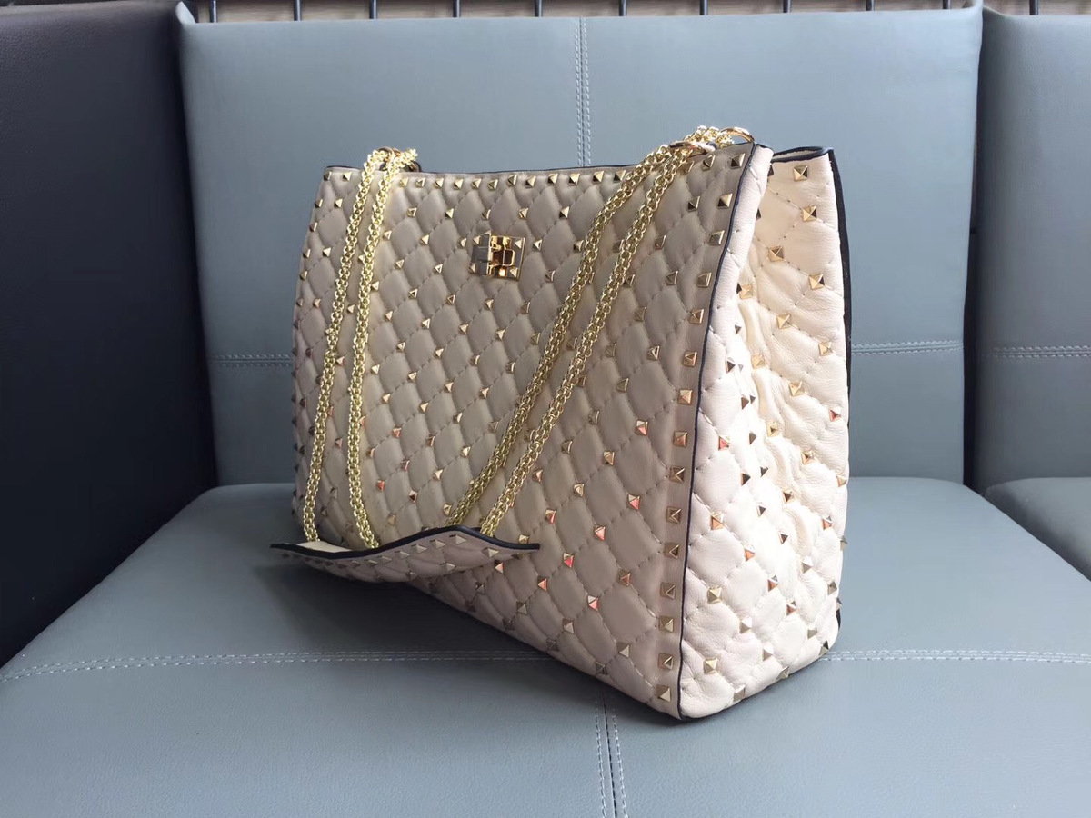Va1e*ntin0 original lambskin spike tote bag in White