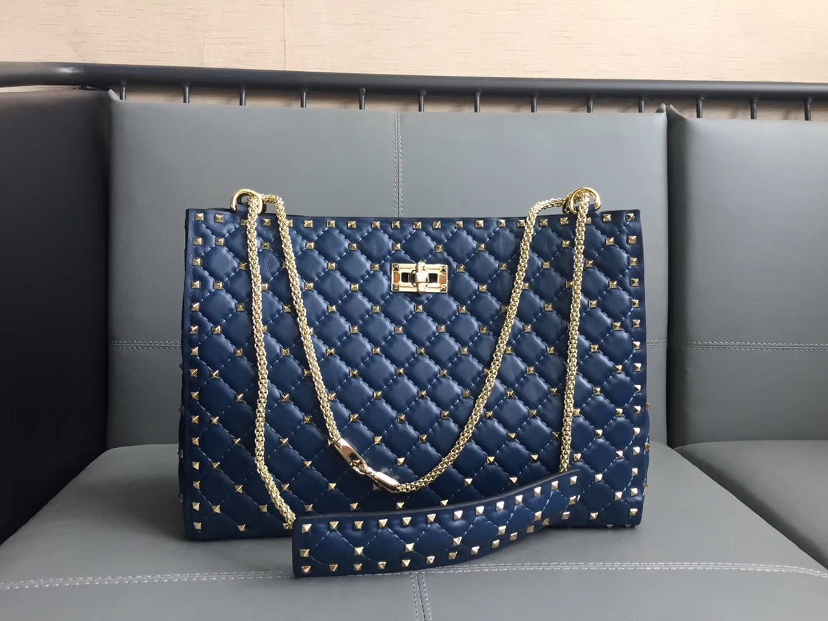 Va1e*ntin0 original lambskin spike tote bag in Blue