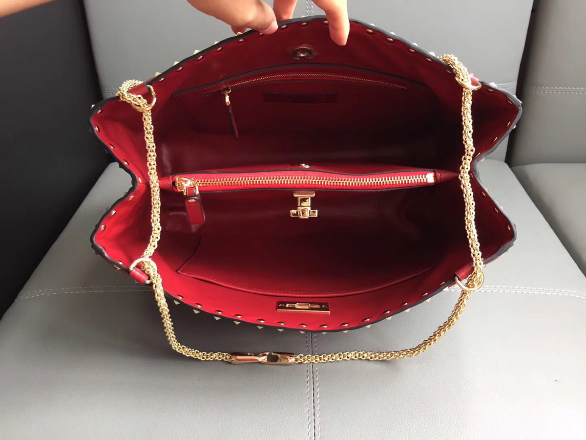 Va1e*ntin0 original lambskin spike tote bag in Red