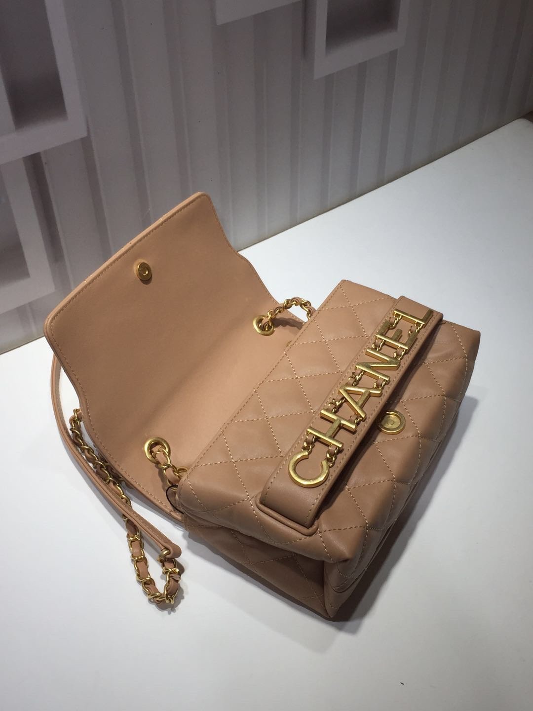 Ch**el small flap bag calfskin goldtone metal beige