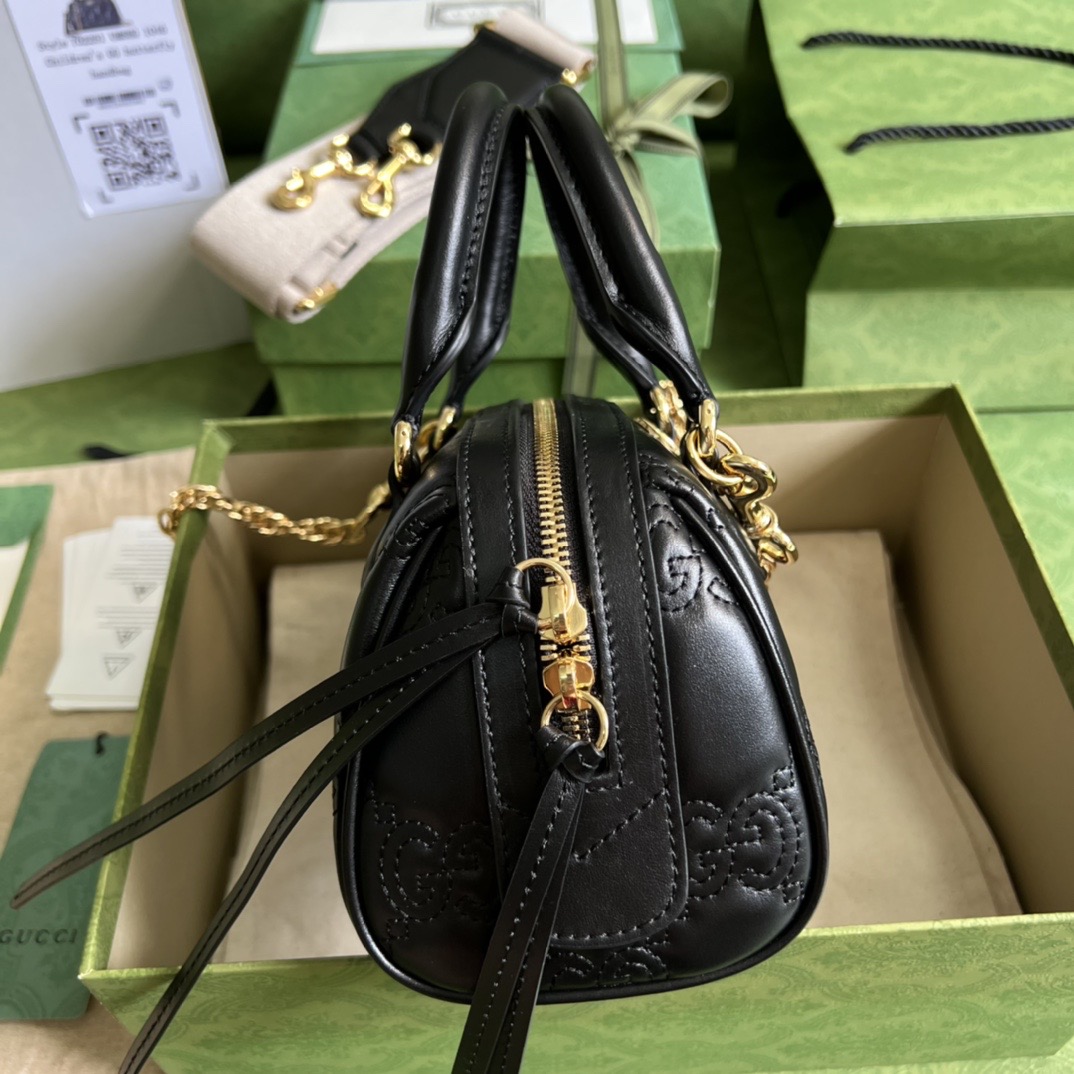 Gvc*1 matelasse leather top handle bag