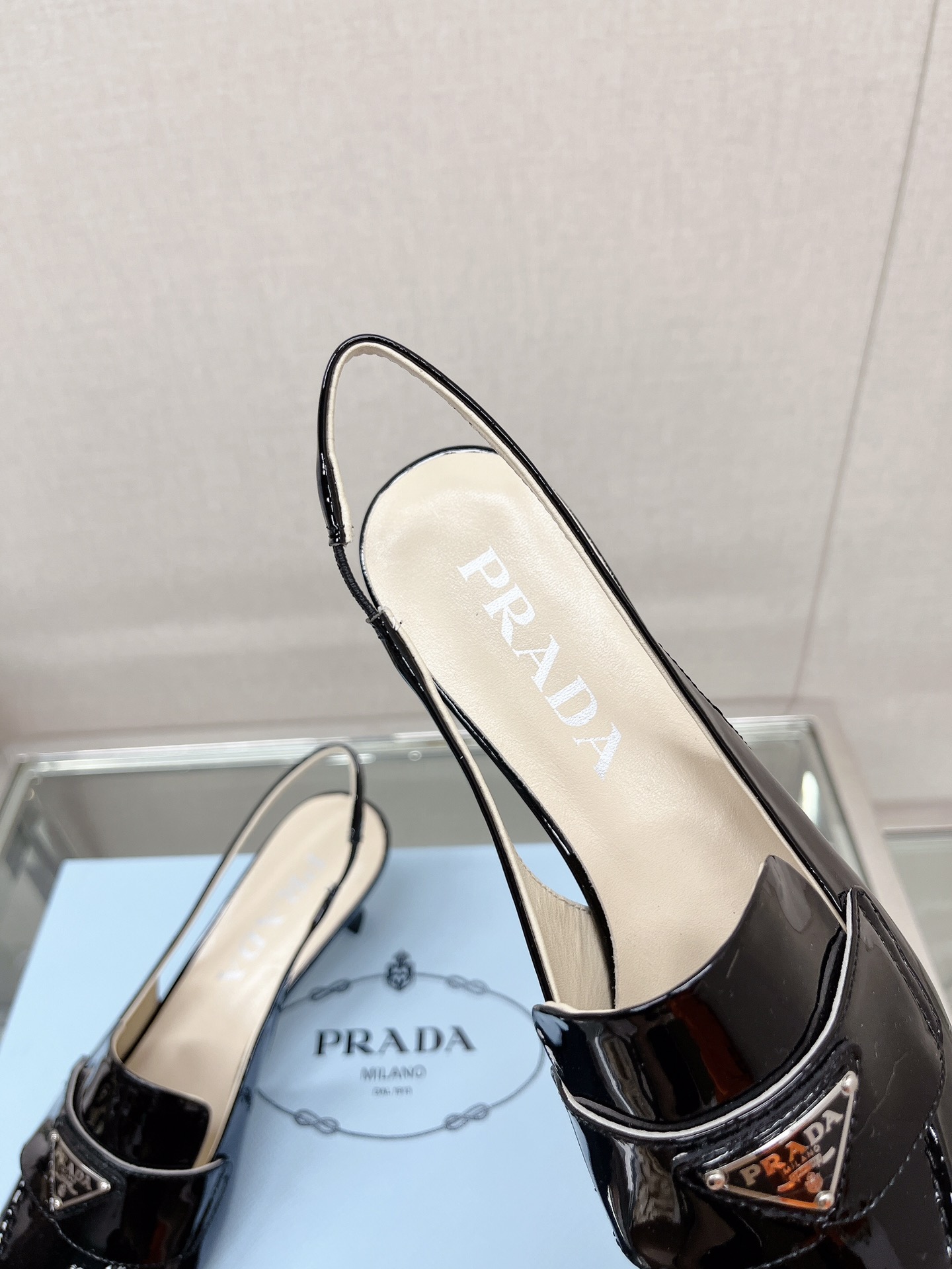 Bagsaaa Pra*a Patent black leather slingbacks (45 mm)