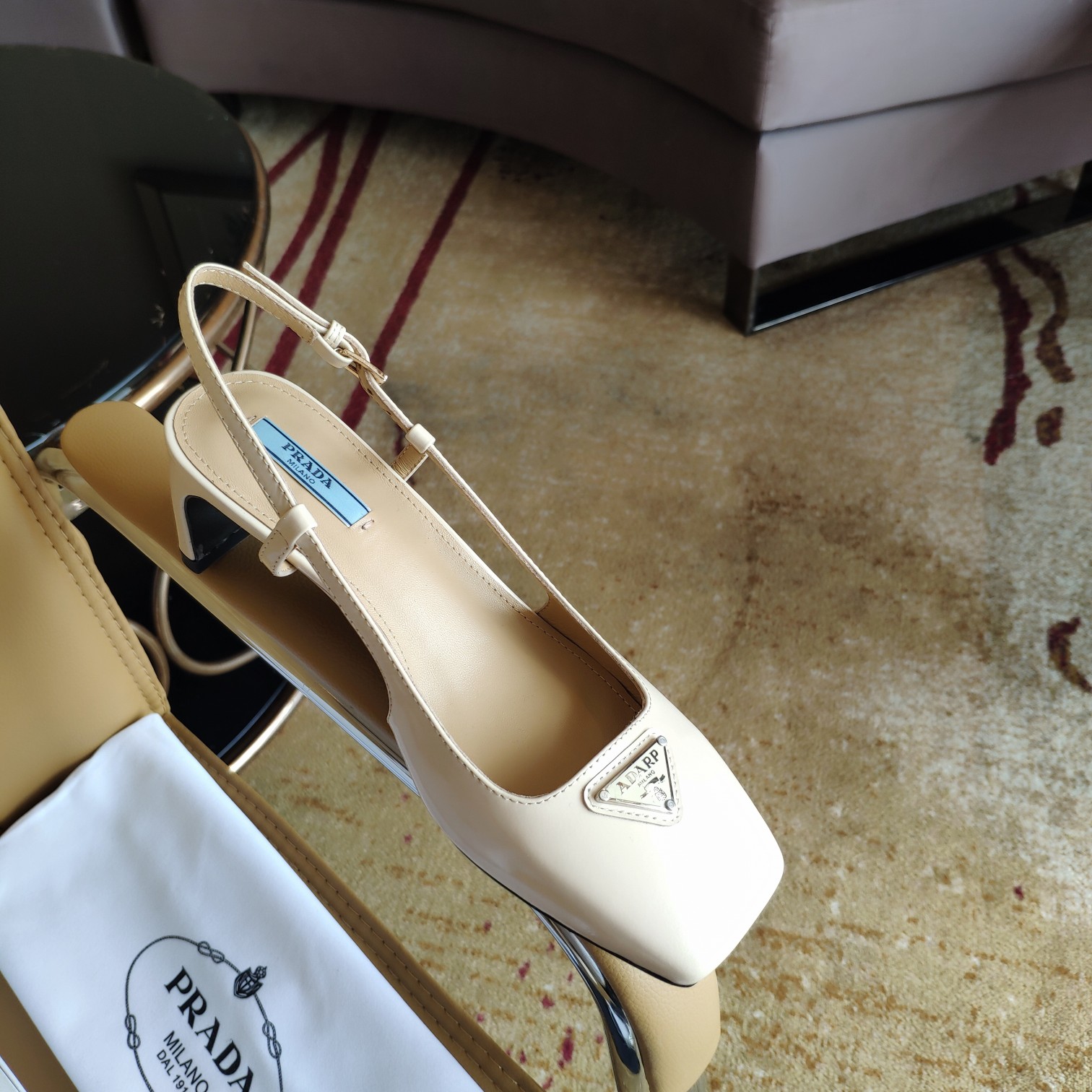 Bagsaaa Pra*a 55 Logo-embellished Leather Slingback Pumps In Beige