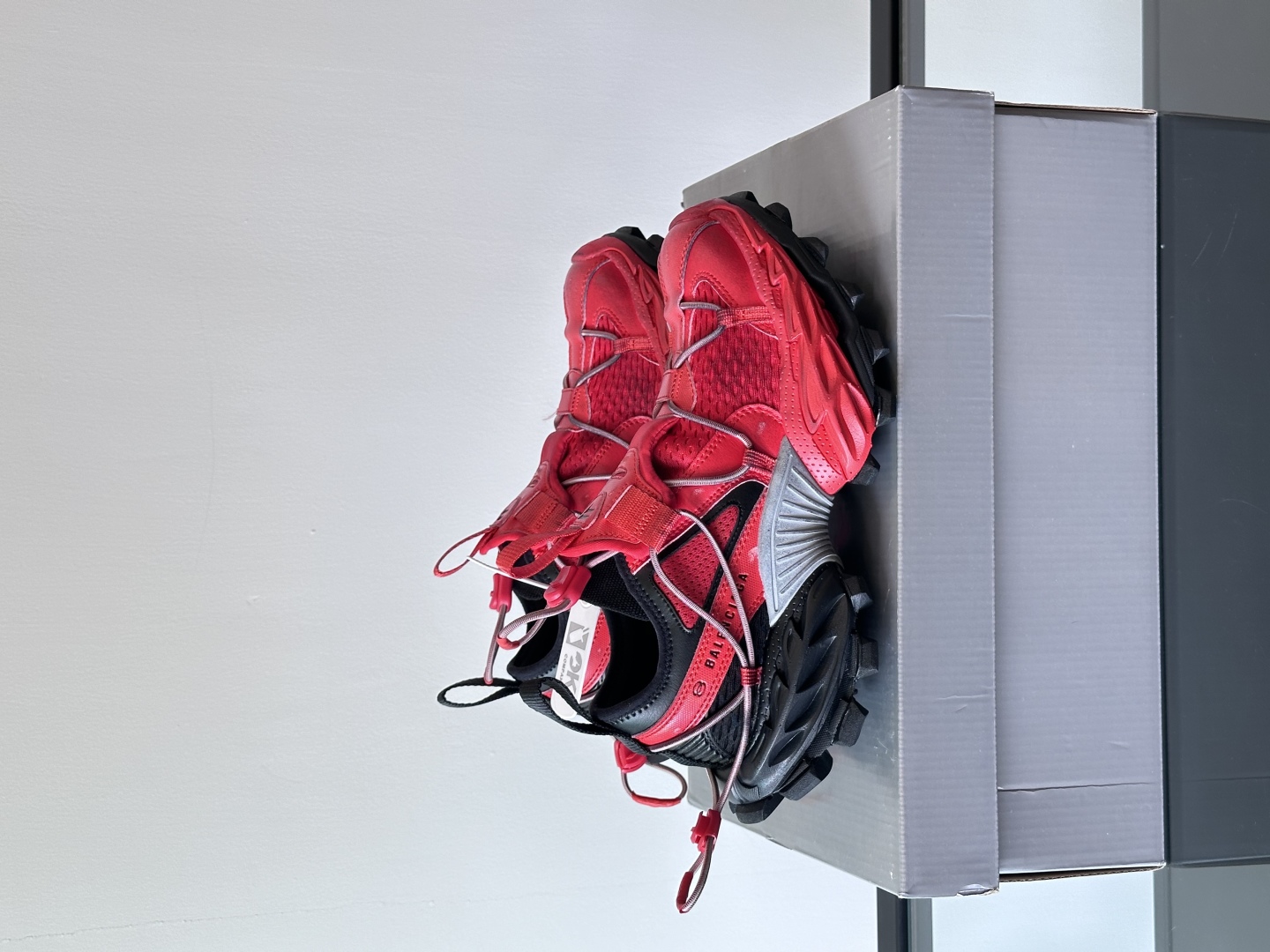 Bagsaaa Ba1en*iaga Hike Sneaker in red and black mesh 