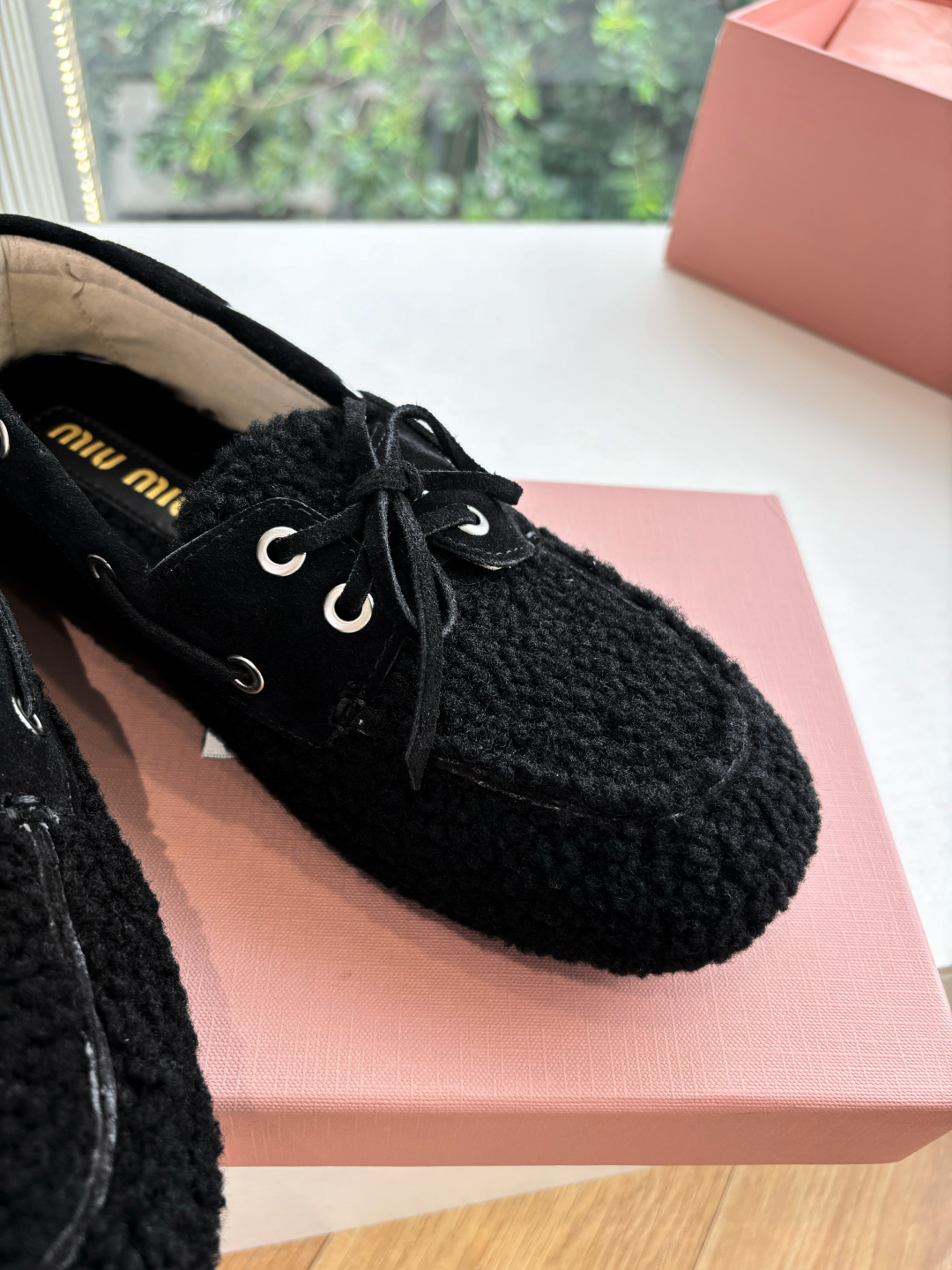 Bagsaaa Miu Miu shearling loafers black