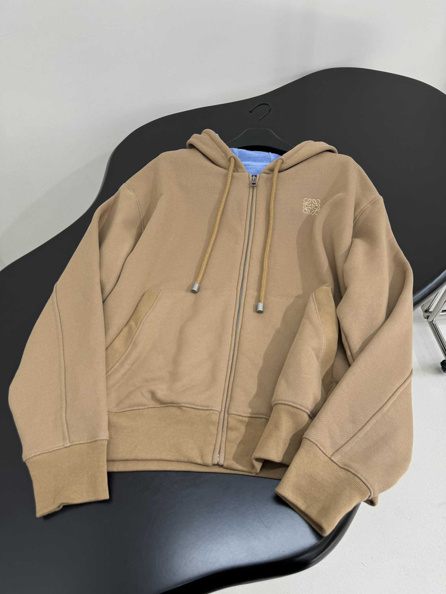 Bagsaaa L0ew* zip-up hoodie in a beige and blue color scheme