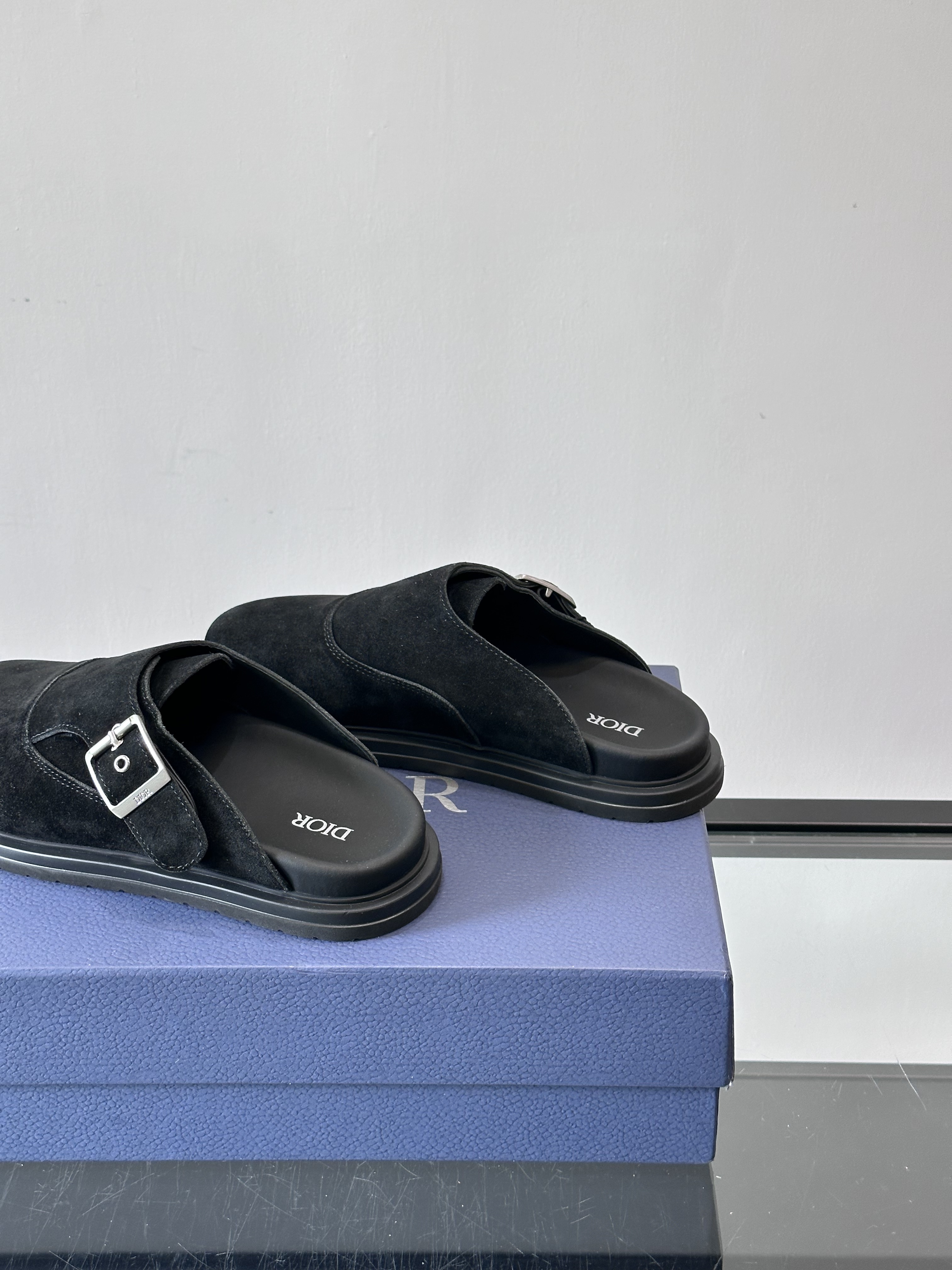 Bagsaaa D10r black mules with silver buckle