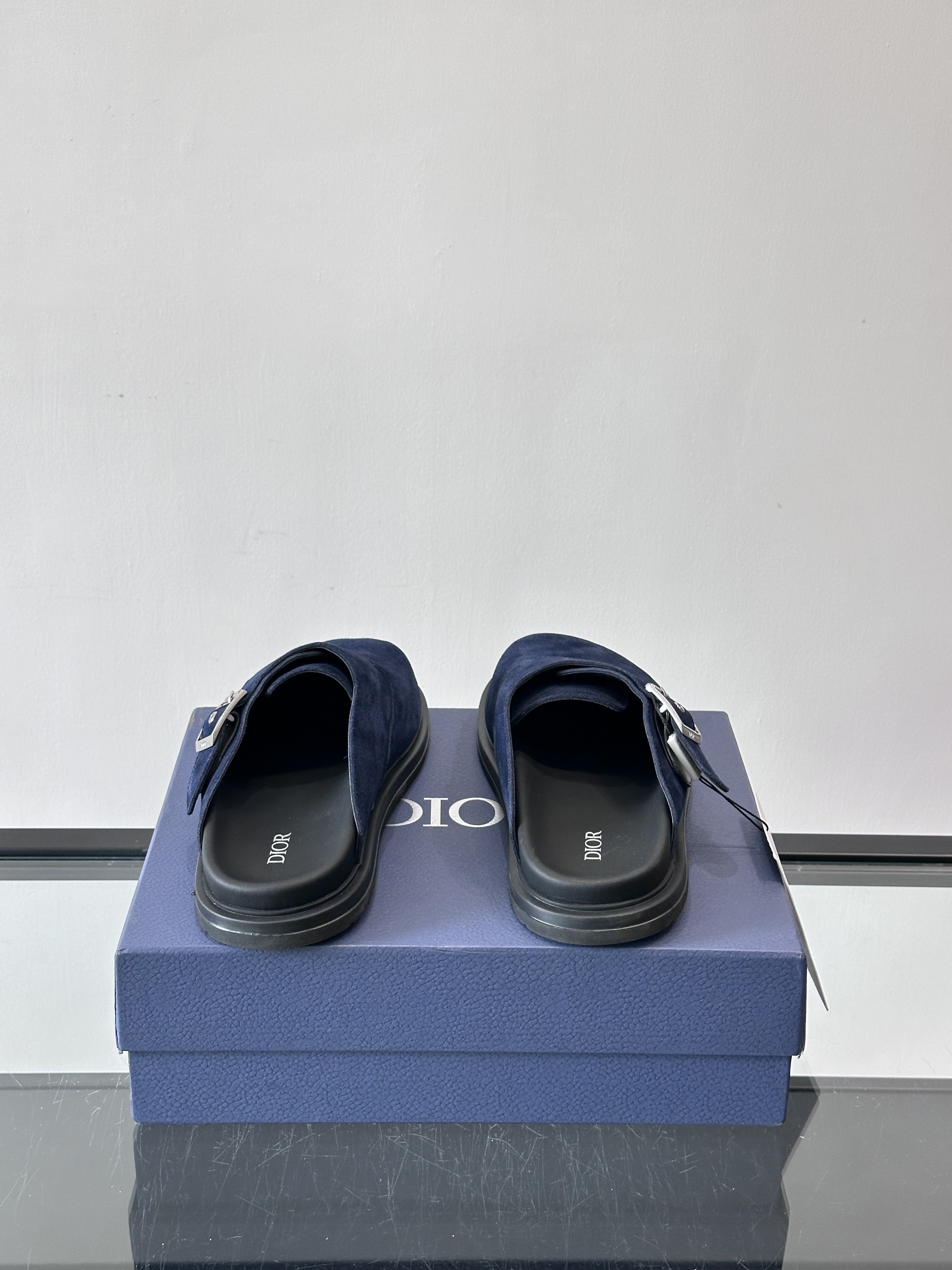 Bagsaaa D10r blue mules with silver buckle