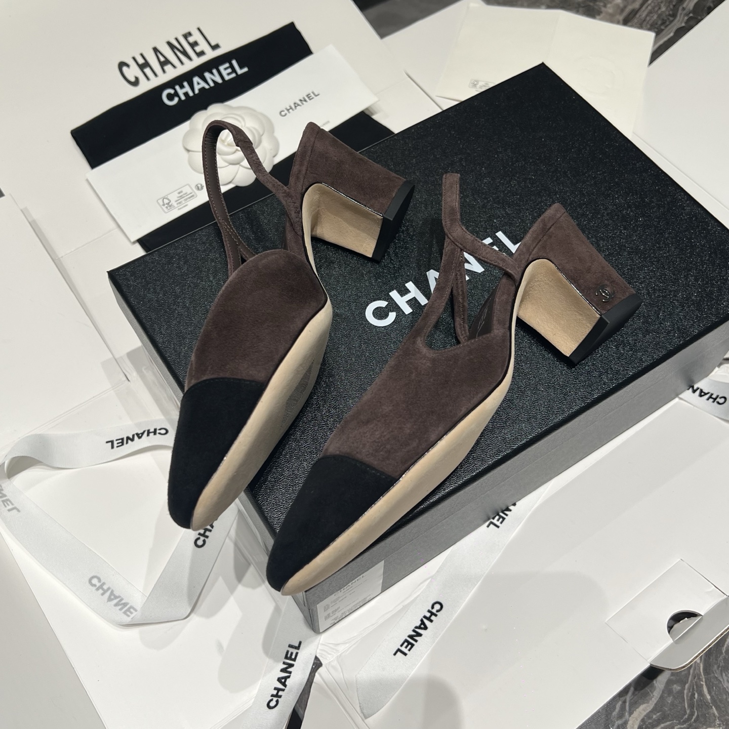 Bagsaaa Ch**el slingback pumps in brown and black suede