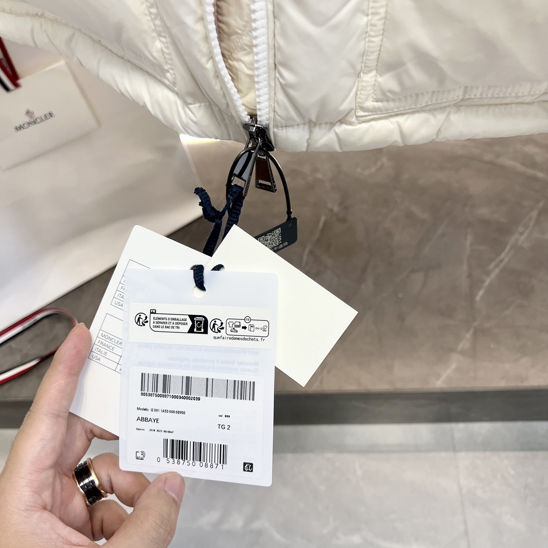 Bagsaaa white Moncler puffer jacket with a light pink hood lining